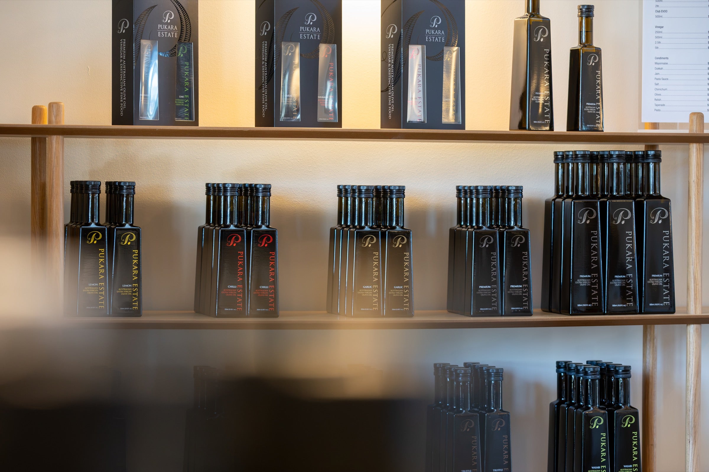 Pukara Estate olive oil range displayed in the tasting room