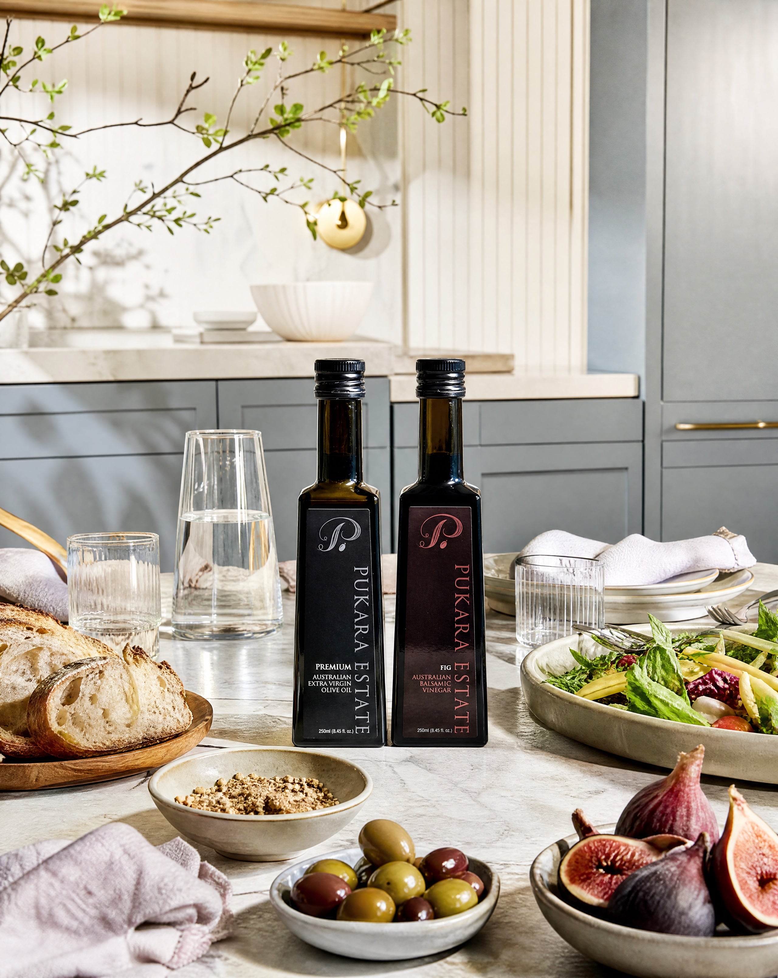 Pukara Estate Premium Extra Virgin Olive Oil and Fig Balsamic Vinegar on a spring entertaining table.